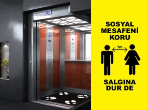 Sosyal mesafe düzeni, asansörlerde etiket yönlendirmeleri ile sağlanıyor